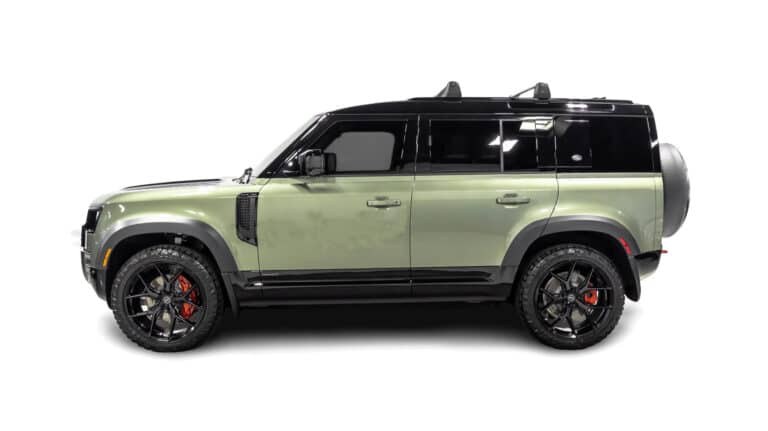 Green Land Rover Defender Side view